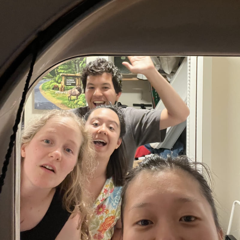 A picture of a group of people taken from the point of view of inside a dryer