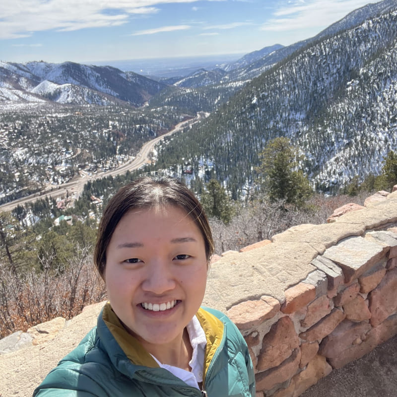 A selfie from the top of a snowy mountain