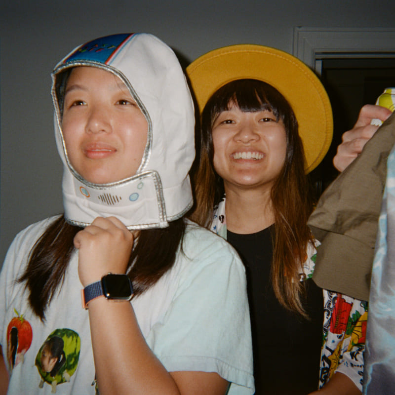 a picture of two girls wearing silly things