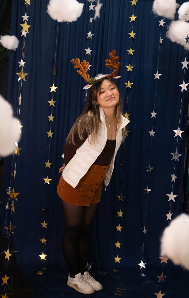 a holiday pic of cindy looking like a cute reindeer