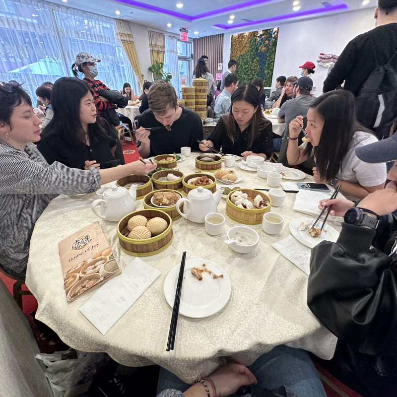 A bunch of people at dim sum